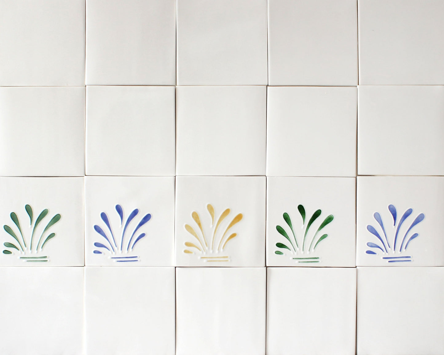 Spray hand painted tiles in Blue