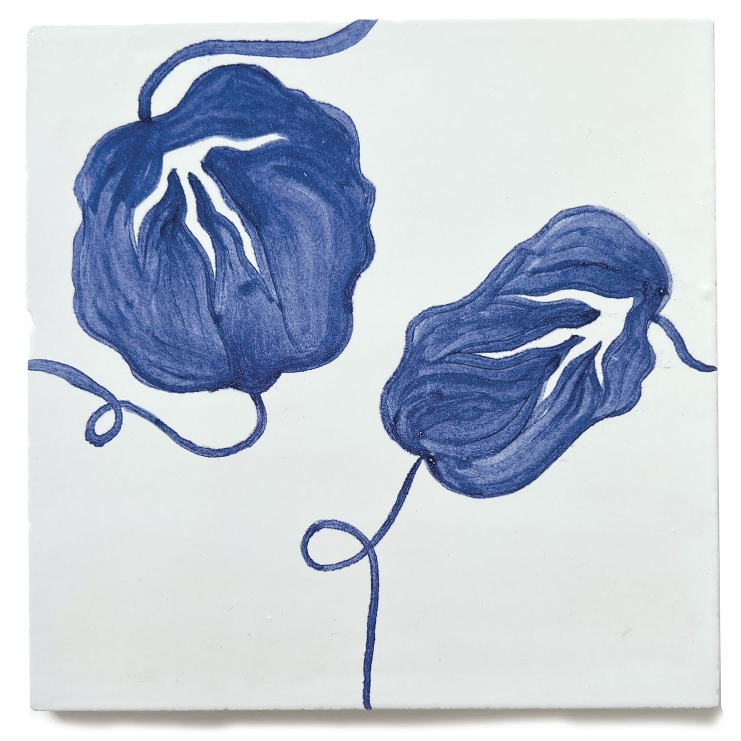 hand painted nasturtium tiles in cobalt blue and white. Blue and white decorative wall tiles for kitchens and bathrooms, hand painted in the UK.