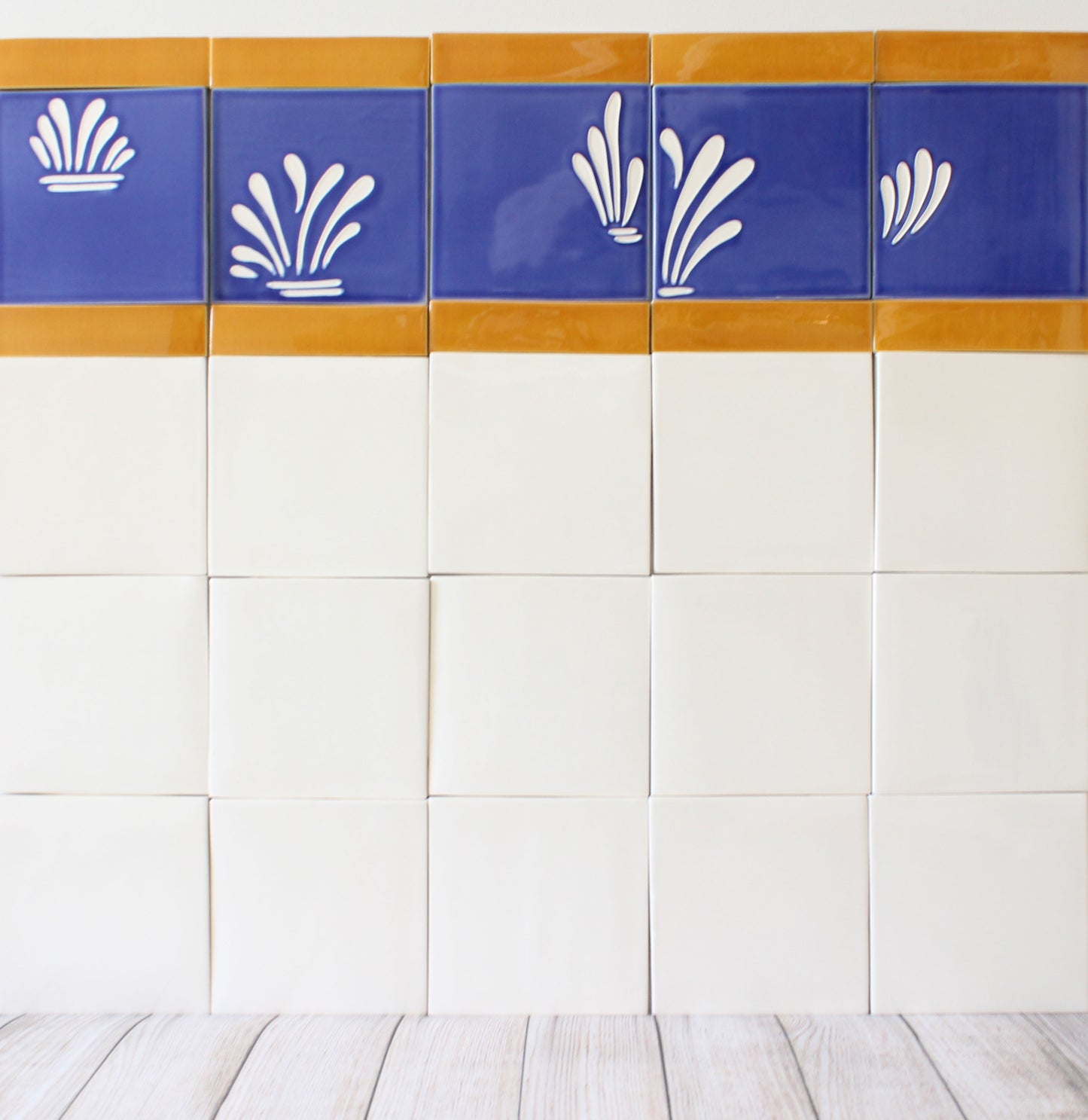 Spray hand painted tiles in Ocean