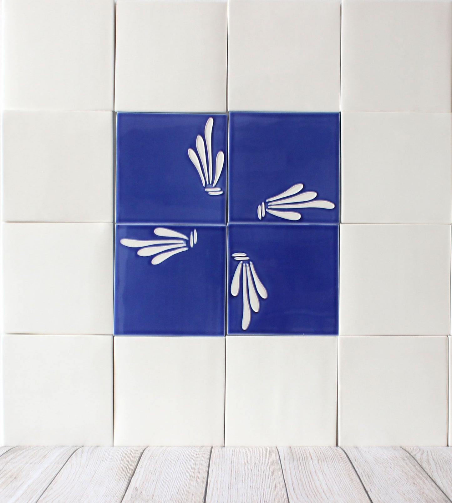 Spray hand painted tiles in Ocean