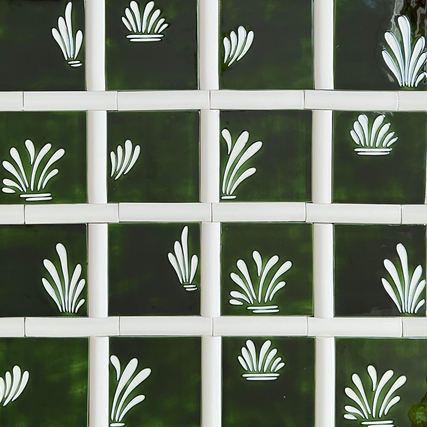 Spray hand painted tiles in Holly