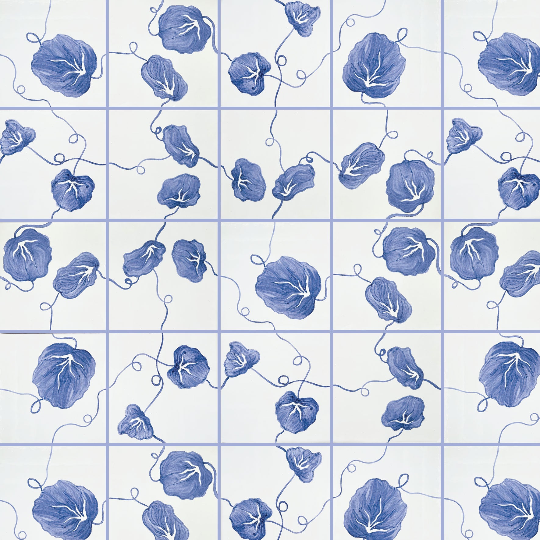 hand painted nasturtium tiles in cobalt blue and white. Shown here with blue grout. Blue and white decorative wall tiles for kitchens and bathrooms, hand painted in the UK.
